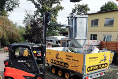 KipperTaxiAnhangerMitStaplerBeladen